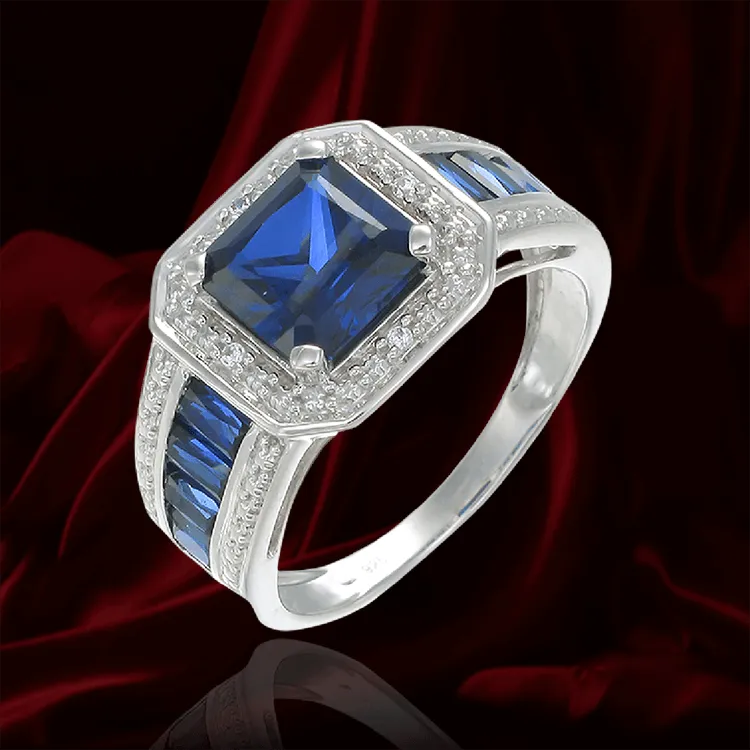 Blue Sapphire Accented Emerald Cut Ring